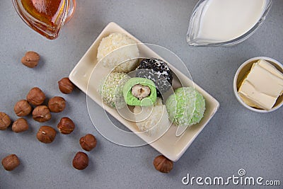 Fat keto peanut butter, cheesecake, matcha coconut balls . keto protein balls and matcha tea recipes ingredients. it works Stock Photo