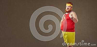 A fat man with a beard in a tracksuit. Stock Photo