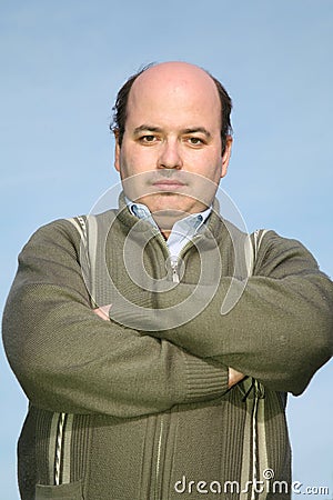 Fat man in a pullover Stock Photo