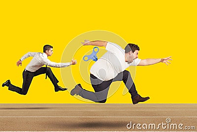Fat man runs very fast without getting tired with extra energy Stock Photo