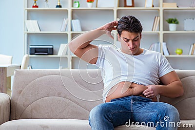 The fat obese man in dieting concept Stock Photo