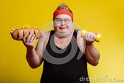 Fat man choise between sport and fastfood Stock Photo