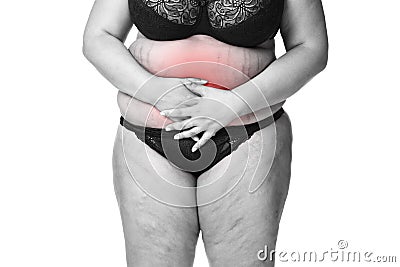 Fat woman with menstrual pain, endometriosis or cystitis, stomach ache, overweight female body isolated on white background Stock Photo