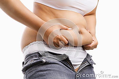 Fat woman pinching her fat tummy Stock Photo