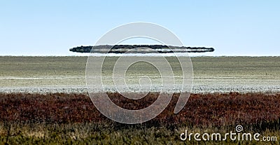 Fata morgana mirage looks like UFO above the desert Stock Photo