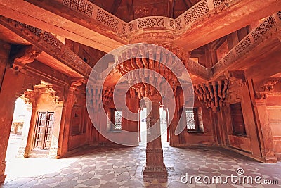 Fatehpur Sikri Agra red sandstone architecture details of pillar structure with lotus top at Agra, India Stock Photo