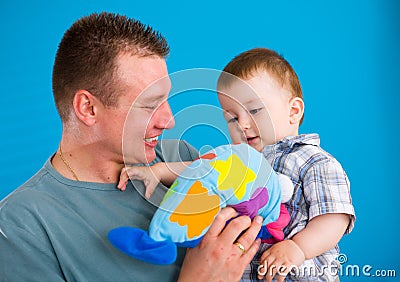 Father carrying happy baby Stock Photo