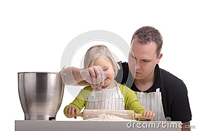 Father and child cooking together Stock Photo