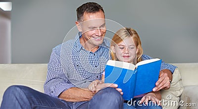 Father, child and reading book for education at home, story and fantasy fiction for learning. Daddy, daughter and Stock Photo