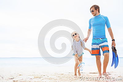 Father and daughter at beach Stock Photo