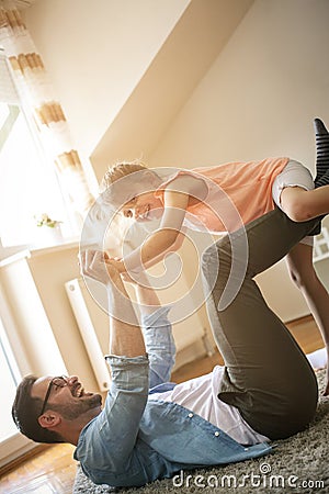 Father and daughter spending time at home. Stock Photo