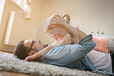 Father and daughter spending time at home. Stock Photo