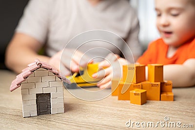 A father and his son are busy with a home move. Home business Stock Photo