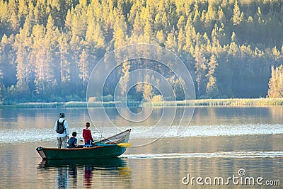 A father and two sons fishing in Idaho Editorial Stock Photo