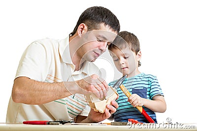 Father and kid child working together Stock Photo