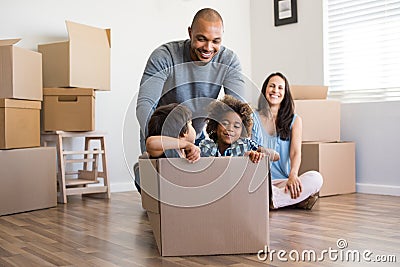 Father playing with children Stock Photo