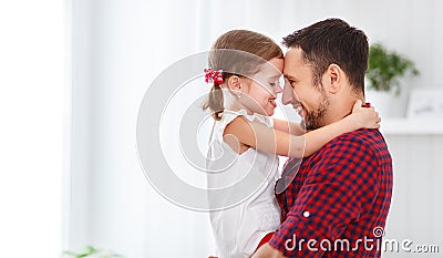 Father`s day. Happy family daughter hugging dad and laughs Stock Photo