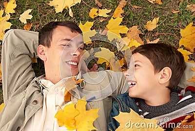 Father and son on the grass Stock Photo
