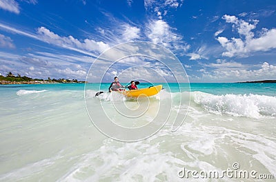 Father and son kayaking Stock Photo