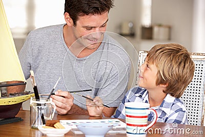 Father and son model making Stock Photo