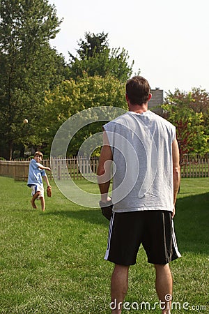 Father and Son Playing catch Stock Photo