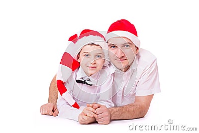 Father and son in Santa's hats Stock Photo