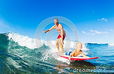 Father and Son Surfing Stock Photo