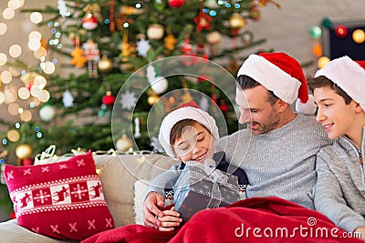 Father and sons at Christmas time Stock Photo