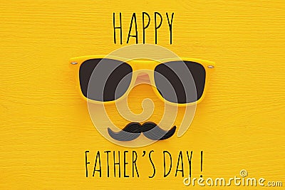 Father& x27;s day concept. Hipster yellow sunglasses and funny moustache Stock Photo