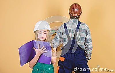 Fatherhood. Family. Industry. Tools for repair. man with little girl. daughter father repairing in workshop. engineering Stock Photo