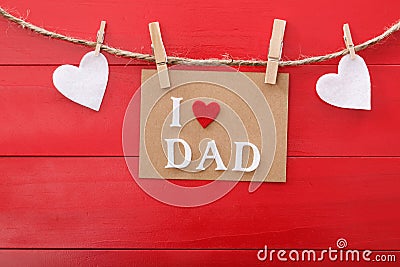 Fathers day message over red wooden board Stock Photo