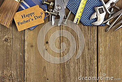 Fathers Day tag with tools and ties border on wood Stock Photo