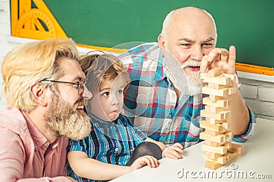 Fathers Day. Three different generations ages: grandfather father and child son together. Stock Photo