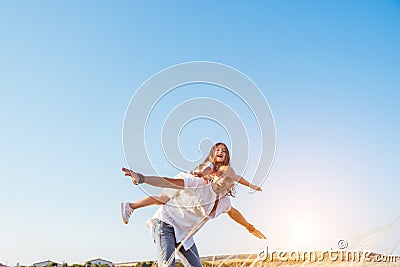 Fathrer and cute daughter playing like airplane Stock Photo