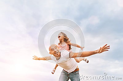 Fathrer and cute daughter playing like airplane Stock Photo