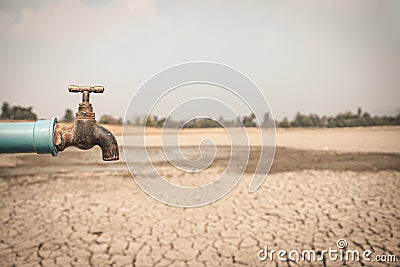 Faucets on dry ground drought and crisis environment Stock Photo