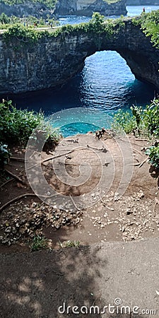 Faulty perforated coral reefs in nusapenida become a mainstay of marine tourism. Stock Photo