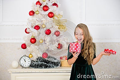 Favorite day of the year. Time to open christmas gifts. Opening christmas presents. Dreams come true. Surprise concept Stock Photo