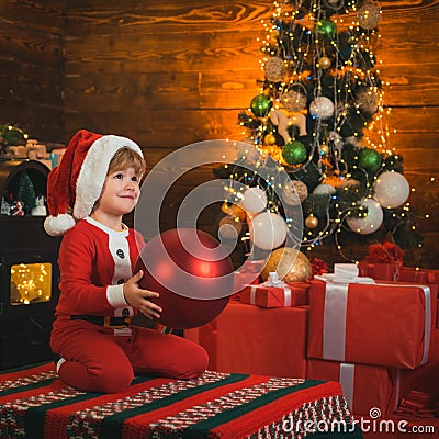 Favorite toy. Baby enjoy christmas. Family holiday. Childhood memories. Santa boy little child celebrate christmas. Boy Stock Photo