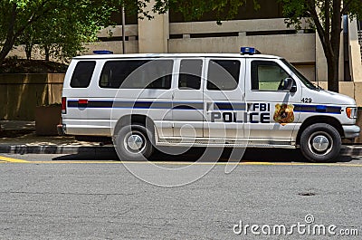 Washington DC: FBI Federal Bureau of Investigation police van parked outside of the J Edgar Hoover building in Editorial Stock Photo