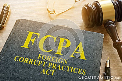 FCPA Foreign Corrupt Practices Act on a desk. Stock Photo