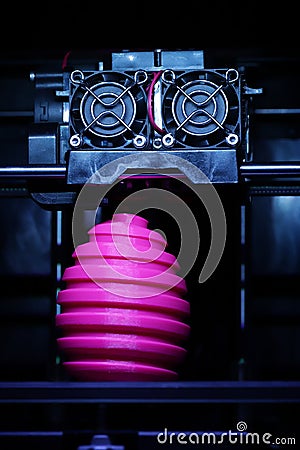 FDM 3D-printer manufacturing wound pink easter egg sculpture - front view on object and print head - portrait composition Stock Photo