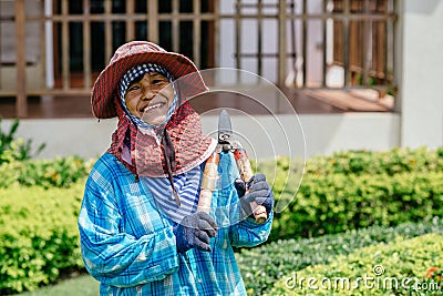 Feamle Thai gardener Editorial Stock Photo