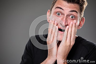 Fear/anxiety/regret/uncertainty in a young man Stock Photo