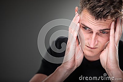 Fear/anxiety/regret/uncertainty in a young man Stock Photo