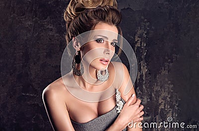 The fear in beauty. A frightened look fashion beautiful woman in luxury clothes Stock Photo