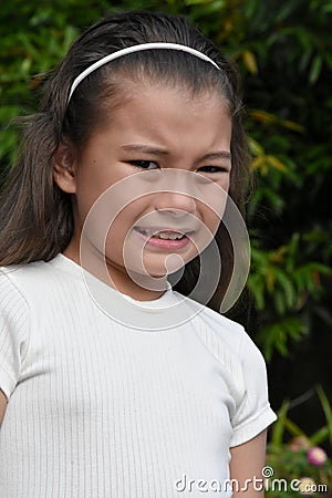 A Fearful Pretty Philippina Female Closeup Stock Photo