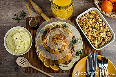 Feasting - stuffed roast chicken with herbs Stock Photo