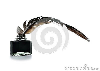 Feather and ink bottle Stock Photo