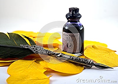 Feather and inkstand Stock Photo